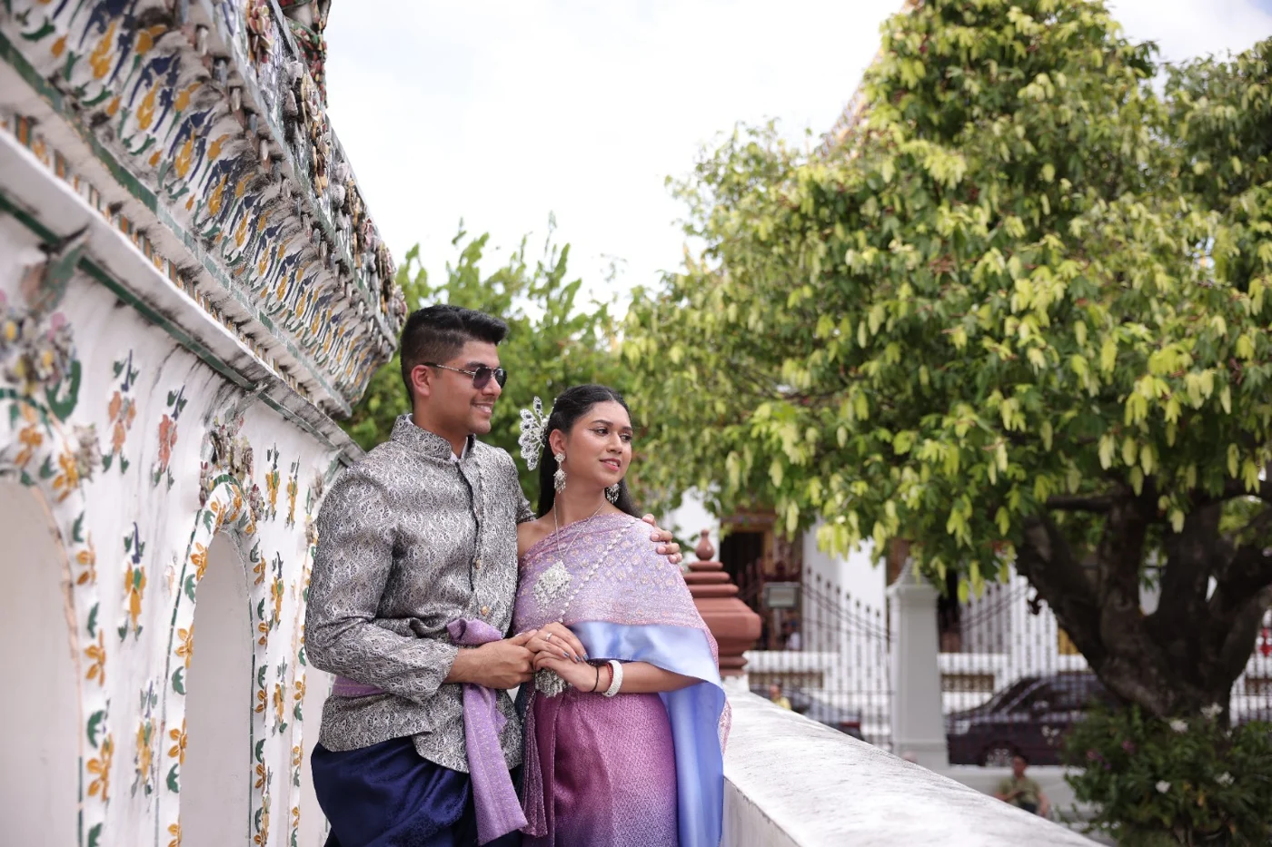 The couple together in the temple courtyard